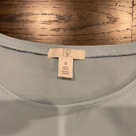 Baby blue peek-a-boo shoulder blouse. Size XS - Picture 2 of 2